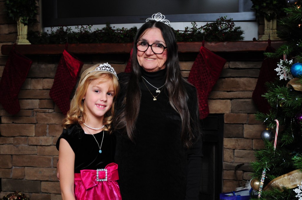 Matching tiaras she bought for the two of them to wear.